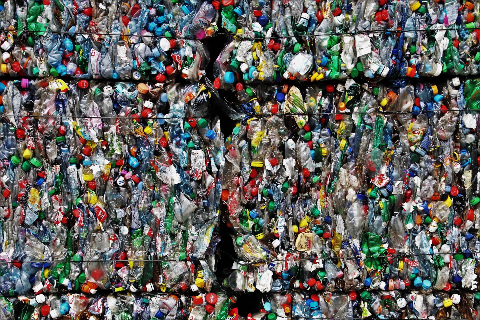 An image of of bundles of plastic bottles as an illustration to support with the PPT blog post